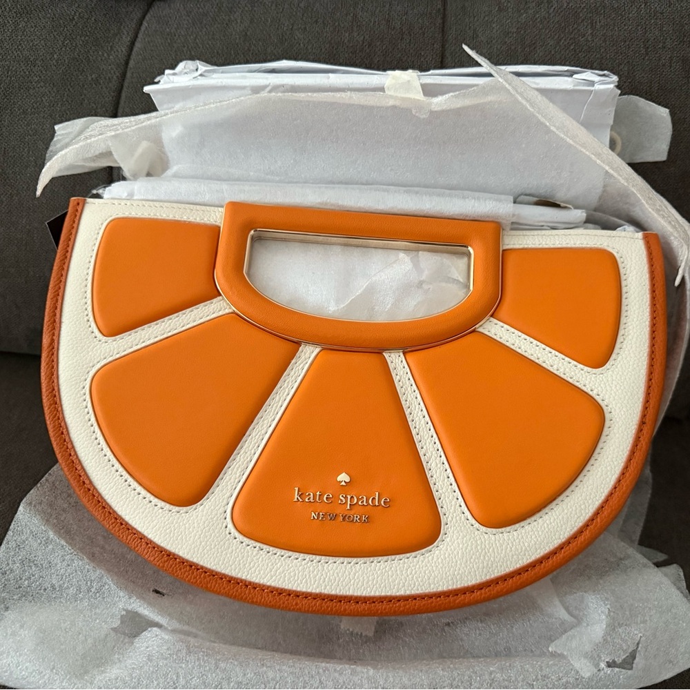 Kate Spade Orange and Cream Clutch